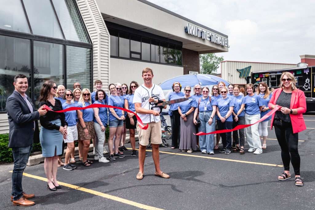A ribbon cutting at Witte Travel and Tours